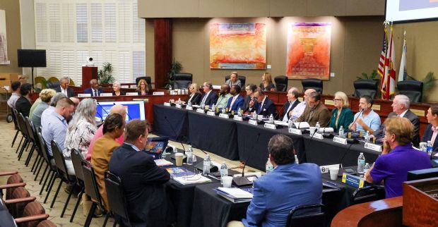 2026 Orange County Tourist Development Tax Citizen Advisory Task Force co-chair Linda Chapin listens to Orange County Mayor Jerry Demings convene the group's first meeting at the Orange County Administration building, Tuesday, July 21, 2026. The TDT panel makes recommendations for the use of future unallocated tourist-tax revenues. (Joe Burbank/Orlando Sentinel)