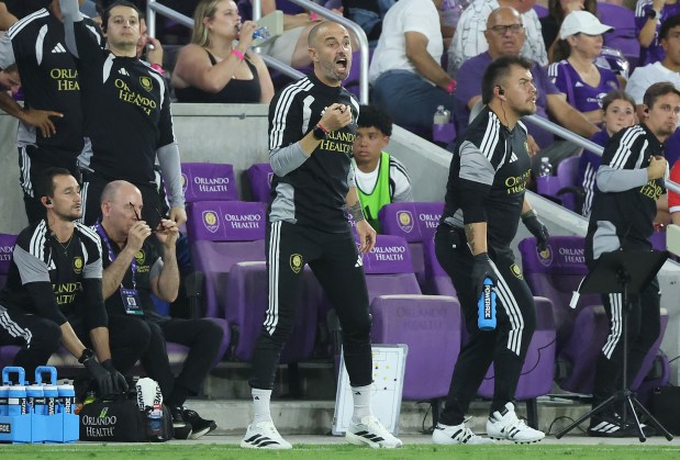 Orlando coach Martin Perelman (middle) yells during the Houston Dynamo FC at Orlando City SC MLS soccer match at Inter&Co Stadium in Orlando on Saturday, April 18, 2026. Houston won the game 1-0. (Stephen M. Dowell/Orlando Sentinel)