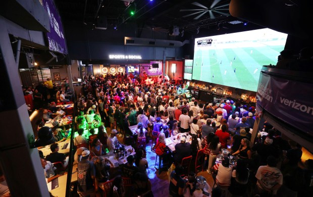 USA soccer fans watch during a "Orlando Soccer Celebration" watch party for the World Cup match between the United States and Belgium at Pointe Orlando on July 6. (Stephen M. Dowell/Orlando Sentinel)