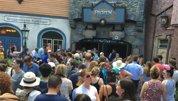 Epcot visitors gather near the entrance of Frozen Ever After, which opened to the public on June 21, 2016. The posted estimated wait time is 240 minutes for opening day. The attraction was created in theme park's Norway pavilion, inside the building that previously housed the Maelstrom ride.