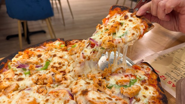 A chicken tikka pie from Mazala Pijja in Orlando. (Photo courtesy Julius Mayo Jr./@droolius)