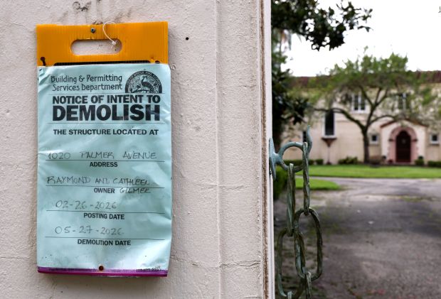 A demolish notice posted by the City of Winter Park at the Merrywood House. (Joe Burbank/Orlando Sentinel)