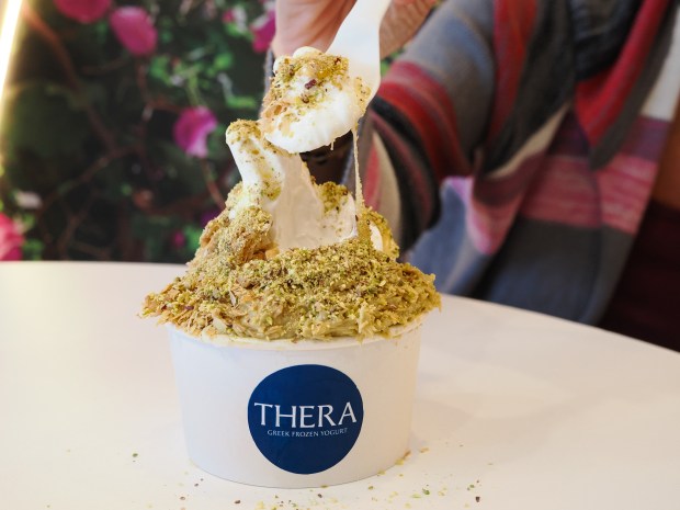 The Santorini baklava special is topped with baklava crunch, pistachio and honey at Thera Greek Frozen Yogurt, which opened in Waterford Lakes last month. (Photo courtesy Lisa Wilk/TasteCookSip.com)