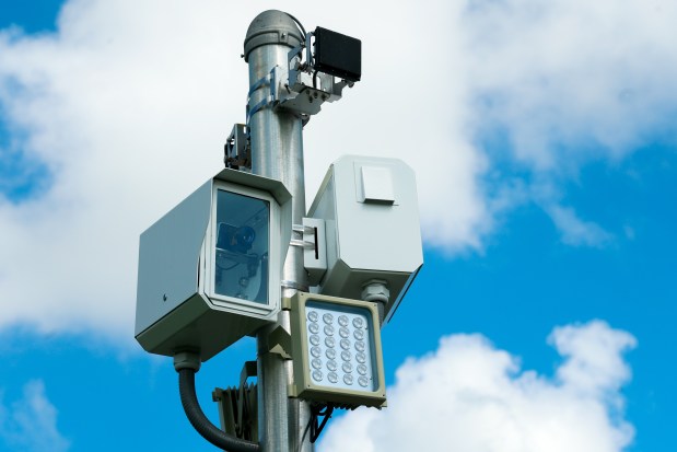 An automated speed camera is perched in a school zone at Maxey Elementary School in Winter Garden on July 1, 2026. Orange County commissioners selected RedSpeed Florida to install and operate automated speed cameras at school zones across the county. (Rich Pope/Orlando Sentinel)