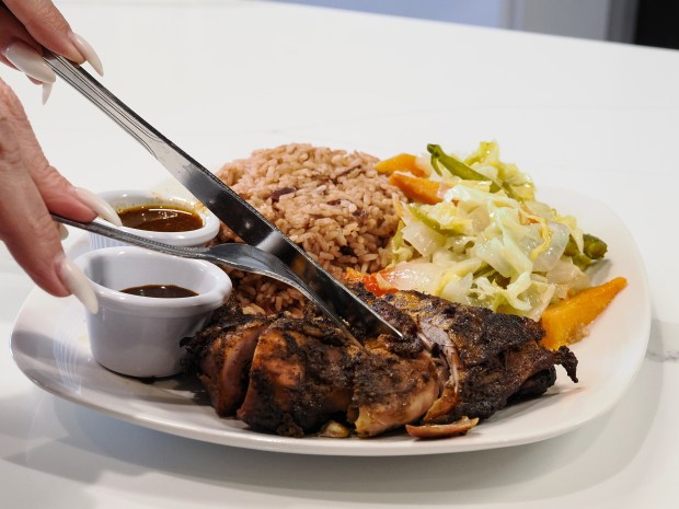 A plate from Flavors of Jamaica, an independent restaurant in Orlando's SoDo District and one that's participating in Sip & Savor Weeks. (Photo courtesy Lisa Wilk/TasteCookSip.com)ity