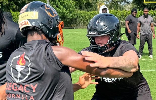 Event champion Elyias Wilson of Cocoa and runner-up Joey Sonennberg of Merritt Island at the 2026 Trench Kings lineman camp at Central Florida Christian Academy, July 18, Orlando, Fla. (Chris Hays/Orlando Sentinel)