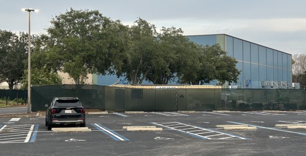 The structure that will hold the SEAQuest: Legends of the Deep attraction at SeaWorld Orlando can be spotted from the parking lot of the theme park. (Dewayne Bevil/Orlando Sentinel)