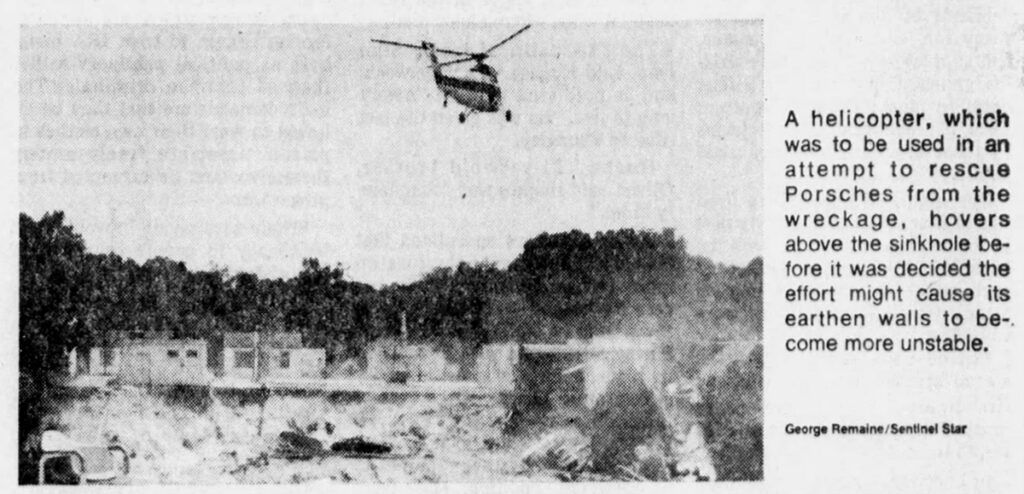 A helicopter hovers above the Winter Park sinkhole during an attempted Porsche recovery operation in 1981.