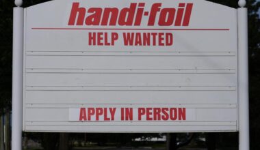 US jobless claims dipped modestly to 215,000 last week