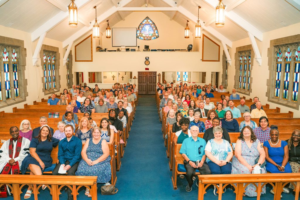 The 2026 congregation recreates the same snapshot for the church’s centennial celebration.
