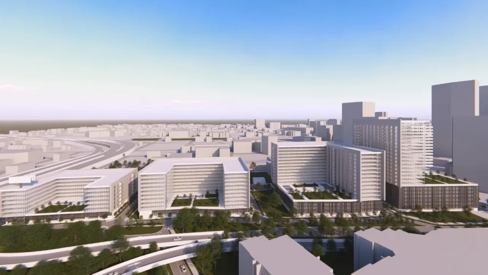 Street-level rendering shows retail and apartments planned for Tampa’s Army/Navy redevelopment site.