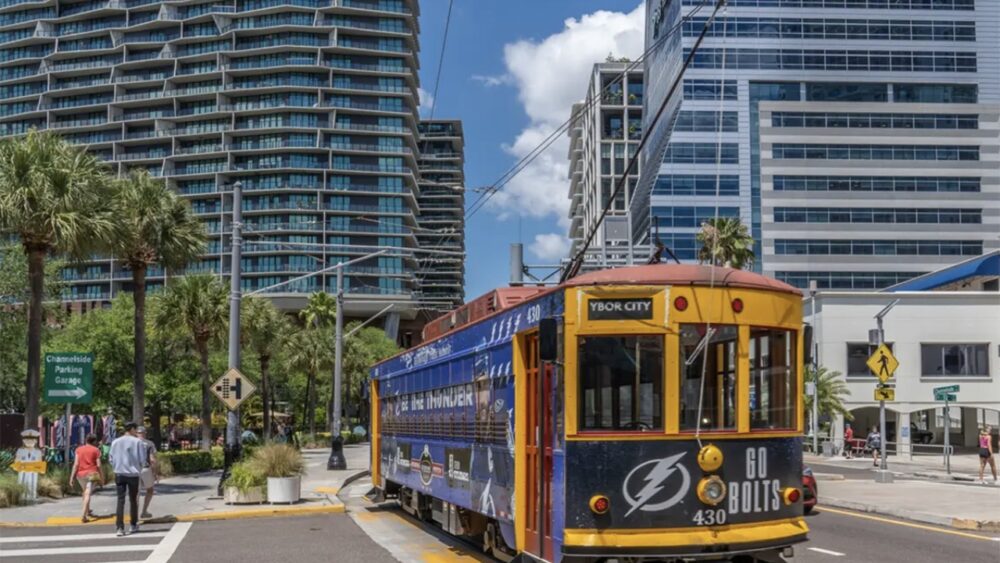 Tampa streetcar passes through downtown Water Street district near Cumberland Avenue