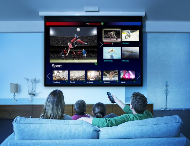 Watching TV in the air conditioning is one way to beat Florida's summer heat. (Robert Daly / Getty Images)