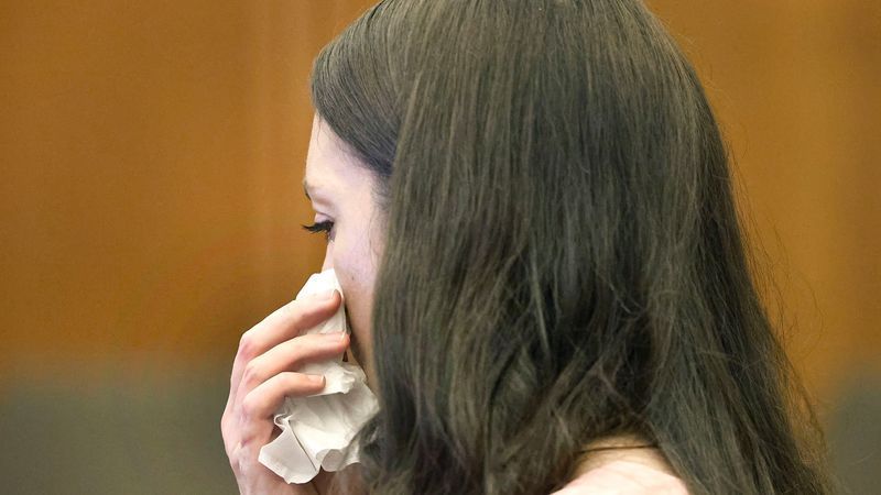 Defendant Lindsay Clancy fights back tears as the details of her children's death are read in court at Plymouth Superior Court in Plymouth, Mass., Monday, July 27, 2026. (Greg Derr/The Patriot Ledger via AP, Pool)