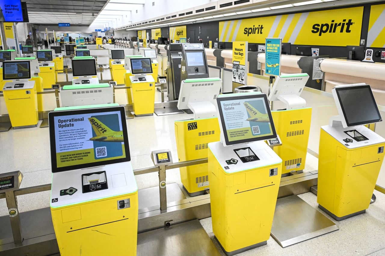 Spirit Airlines check-in kiosks sit empty at Fort Lauderdale-Hollywood International Airport after the company ceased operations on May 2.Credit: GIORGIO VIERA / AFP via Getty