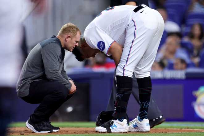 Arizona Diamondbacks v Miami Marlins MIAMI, FLORIDA - APRIL 16: Avisail Garcia #24 of the Miami Marlins reacts after suffering an injury during the seventh inning against the Arizona Diamondbacks at loanDepot park on April 16, 2023 in Miami, Florida. (Photo by Megan Briggs/Getty Images)