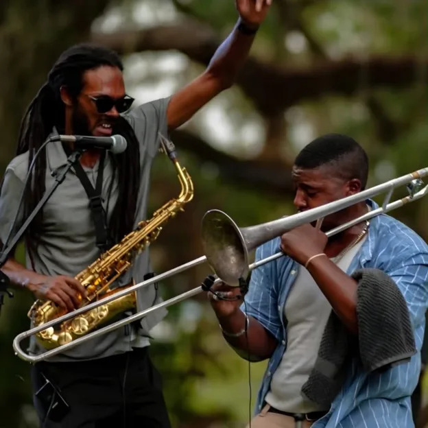 Aaron Watson III and Kirk Gavin III, co-frontman and founder of one of Tallahassee’s premier funk bands, Pharaohs of Funk.