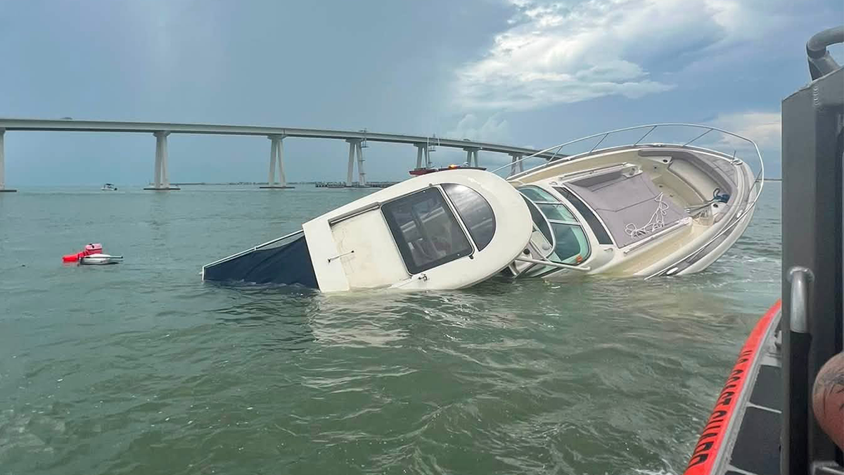 The U.S. Coast Guard shared photos of the sinking into the water near Fort Myers Beach.