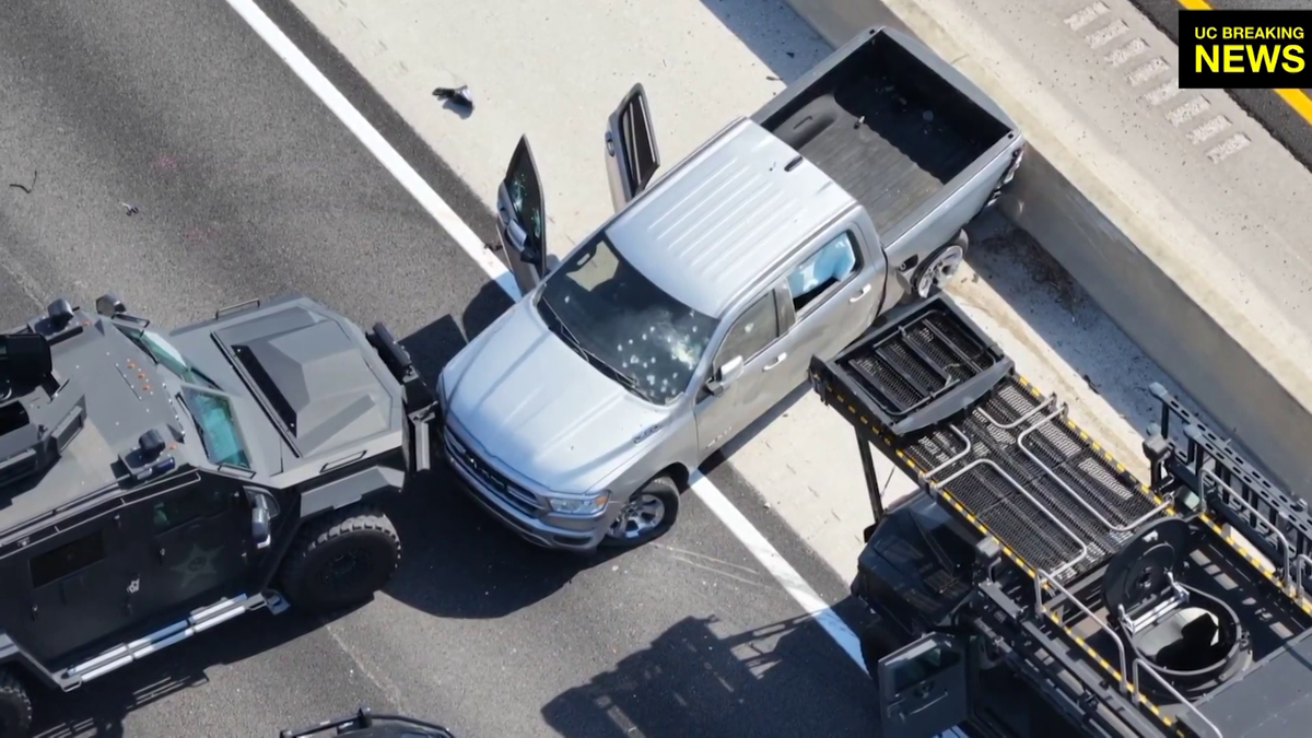 Murder suspect in custody after hourslong standoff that shut down I-75 near Alico Road