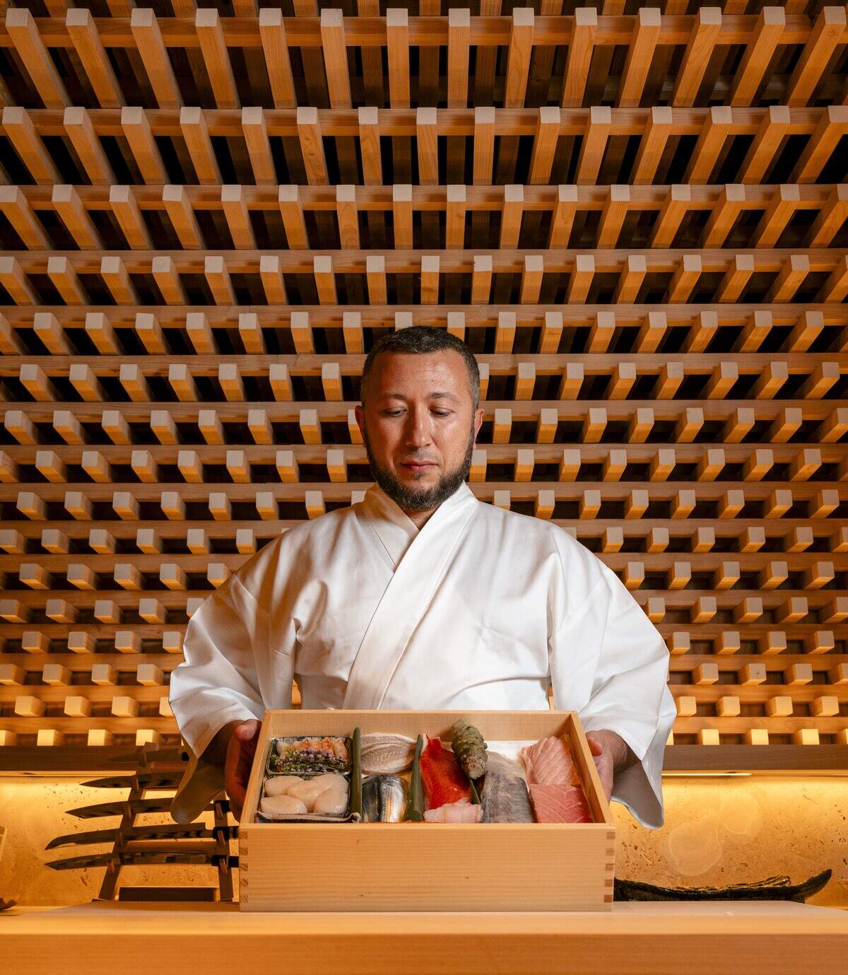 Chef and founding partner Glen Kotlyarski with some of the seafood that will be served at Takay in Miami.