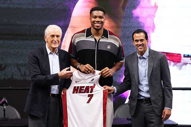 Miami Heat Introduces Bobby Portis, Jr. and Giannis Antetokounmpo MIAMI, FLORIDA - JULY 16: Miami Heat President Pat Riley (L) and head coach Erik Spoelstra (R) pose for a photo with Giannis Antetokounmpo #7 of the Miami Heat during an introductory press conference at Kaseya Center on July 16, 2026 in Miami, Florida. NOTE TO USER: User expressly acknowledges and agrees that, by downloading and or using this photograph, User is consenting to the terms and conditions of the Getty Images License Agreement. (Photo by Megan Briggs/Getty Images)