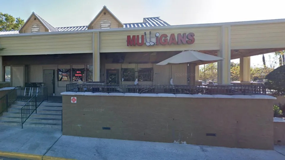 Exterior of Mulligan's Irish Pub in Longwood, Florida, where deputies say an intoxicated man left before being arrested after riding an electric bicycle.