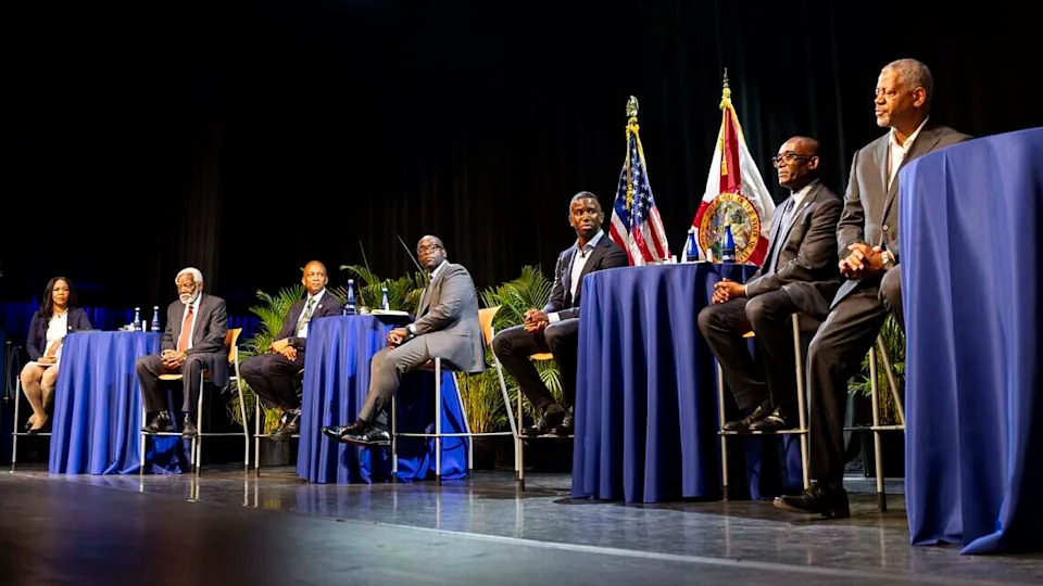 From left to right: Te Mayonna Brown, African Heritage Cultural Arts Center Managing Director Marshall L. Davis Sr., Former Miami-Dade commissioner Oliver Gilbert, Florida State Senator Shevrin Jones, Kendrick Meek Jr., Former Miami-Dade commissioner Jean Monestime and Miami Criminal Defense Attorney Roderick Darrell Vereen participate in a town hall debate ahead of the U.S. House Florida District 24 race at Florida Memorial University on Tuesday, June 30, 2026, in Miami Gardens, Fla.