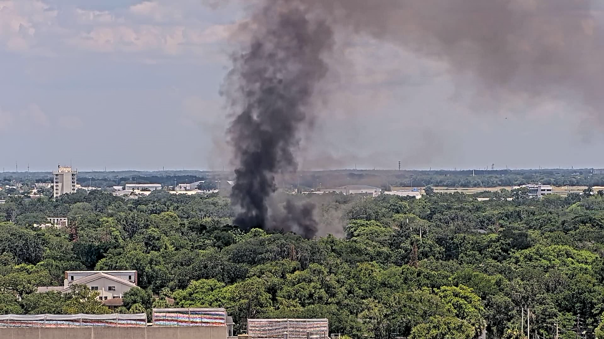 Crews respond to house fire near downtown Orlando