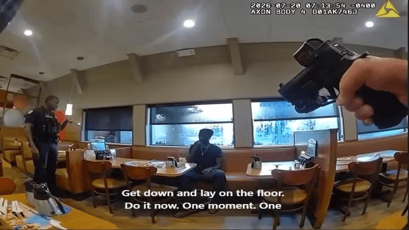 {p}Body camera video released by the Orlando Police Department shows bicycle officers entering the restaurant and confronting Matthie as he sat at a table. (Orlando Police Department){/p}
