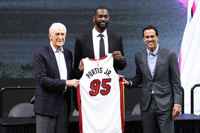 Miami Heat Introduces Bobby Portis, Jr. and Giannis Antetokounmpo MIAMI, FLORIDA - JULY 16: Miami Heat President Pat Riley and head coach Erik Spoelstra pose for a photo with Bobby Portis #95 of the Miami Heat during an introductory press conference at Kaseya Center on July 16, 2026 in Miami, Florida. NOTE TO USER: User expressly acknowledges and agrees that, by downloading and or using this photograph, User is consenting to the terms and conditions of the Getty Images License Agreement. (Photo by Megan Briggs/Getty Images)