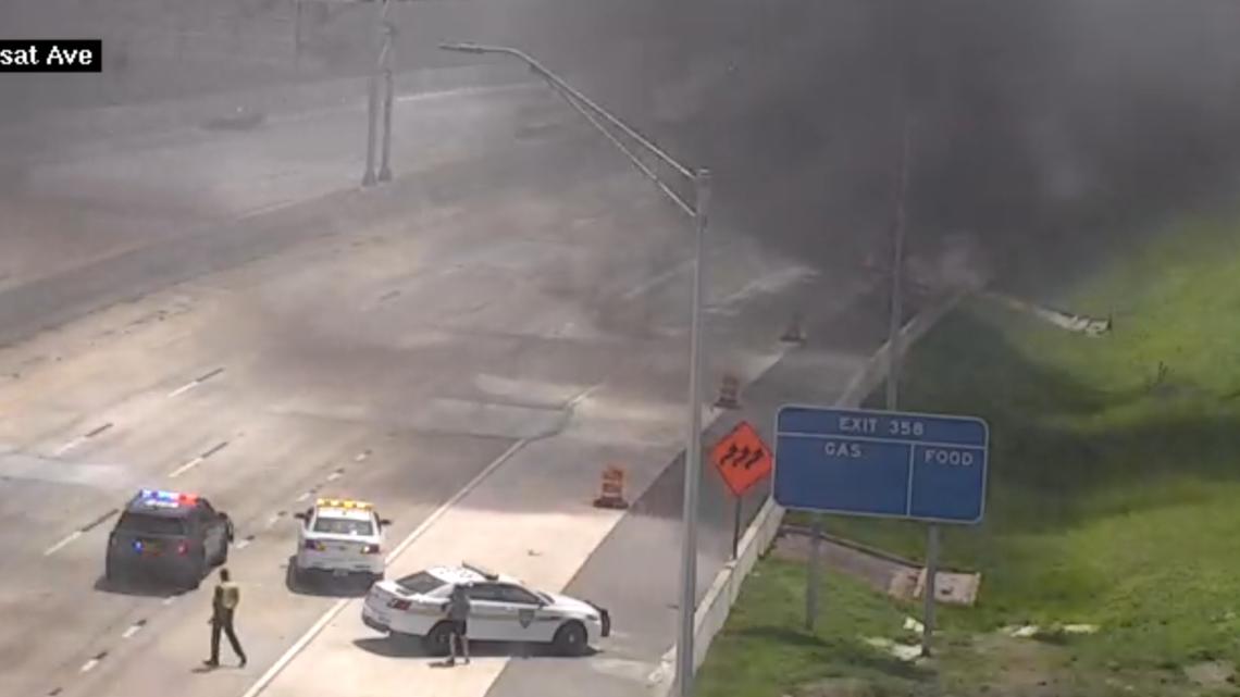 Massive car fire shuts down I-10 at Cassat Avenue
