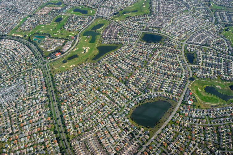 aerial photo of homes and golf courses in The Villages, Florida