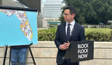 Republican gubernatorial candidate James Fishback calls for Flock surveillance cameras to be banned in Florida during a rally Tuesday outside the U.S. courthouse in Orlando. (Spectrum News)