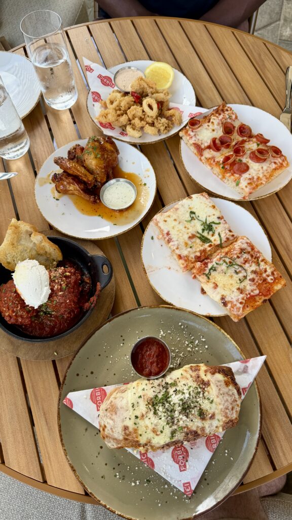 Plates of food at Forbici in St. Pete