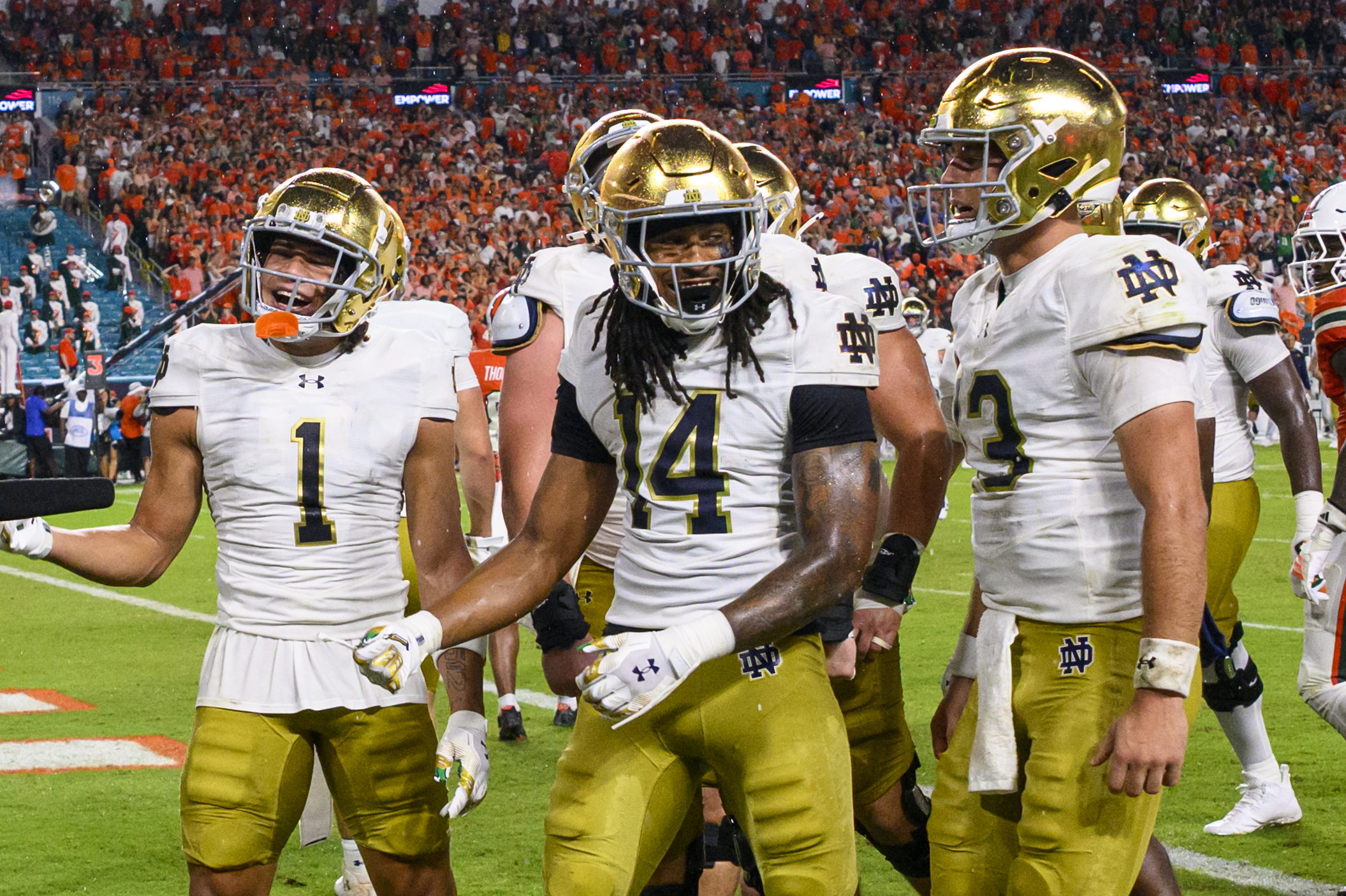 MIAMI GARDENS, FL - AUGUST 31: Notre Dame wide receiver Micah Gilbert (14) celebrates scoring a touchdown with Notre Dame wide receiver Jaden Greathouse (1) and Notre Dame quarterback CJ Carr (13) during the college football game against the University of Miami Hurricanes on August 31, 2025 at the Hard Rock Stadium in Miami Gardens, FL. (Photo by Doug Murray/Icon Sportswire via Getty Images)