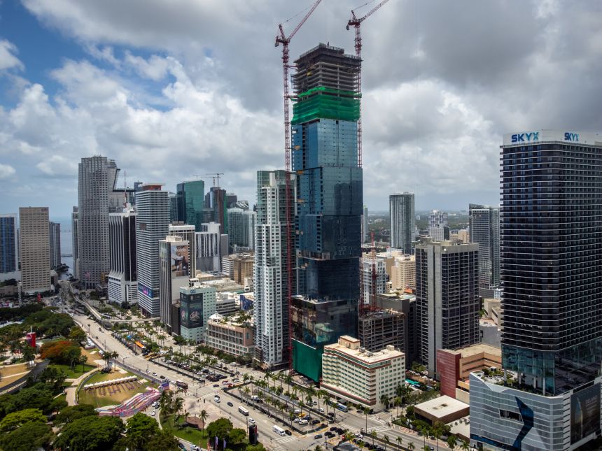 The Waldorf Astoria Miami, designed by Carlos Ott and Sieger Suarez Architects, will be the city's first supertall at 1,049 feet. It is scheduled to open in 2028.