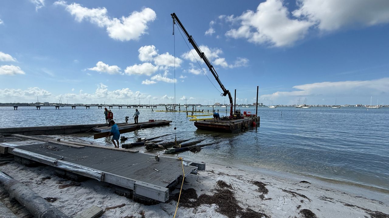 Demolition of day docks at the Gulfport Casino Ballroom