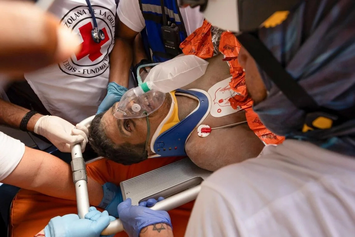 Miami firefighters help rescue man buried in rubble for eight days after earthquake