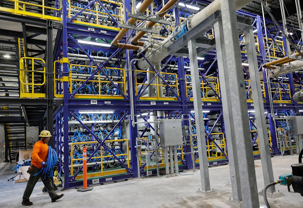New Fort Lauderdale plant will turn yellow drinking water clear. But experts say old pipes may discolor it again