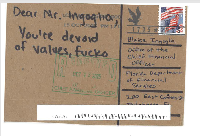 A postcard reading "You're devoid of values, fucko"
