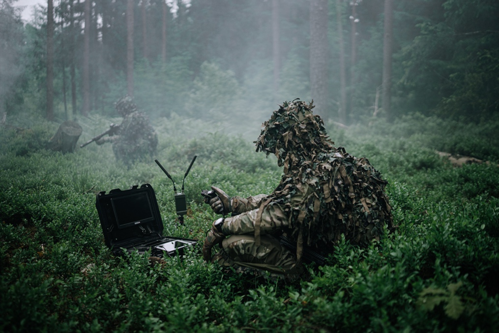 British Army soldiers operate XTEND autonomous drone systems during a military training exercise.