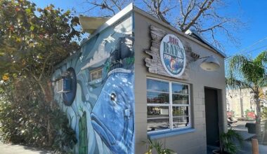 Exterior of Big Ray's Fish Camp in South Tampa, featuring a colorful fish mural on the building after the restaurant was named to Michelin's national seafood shack list.
