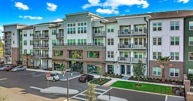 Exterior view of the 296-unit Cortland Santos Flats apartment community at 8733 Rooks Park Circle in eastern Hillsborough County.