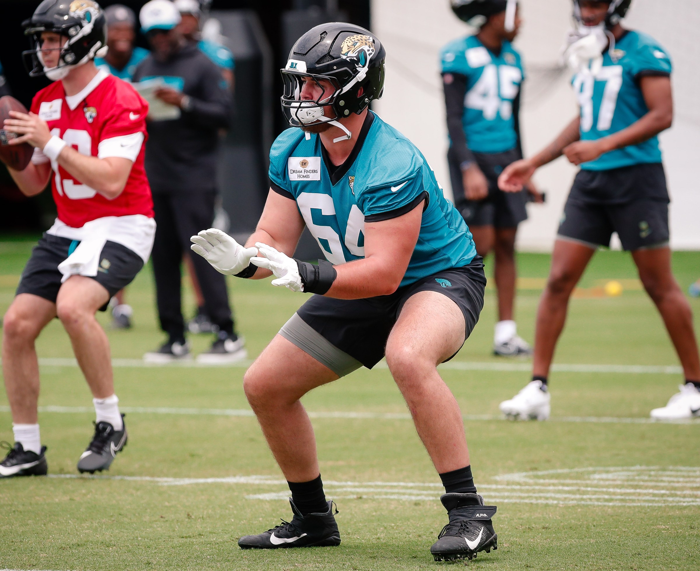 May 10, 2025; Jacksonville, FL, USA; Jacksonville Jaguars offensive lineman Wyatt Milum (64) participates in a drill during rookie minicamp at Miller Electric Center. Mandatory Credit: Travis Register-Imagn Images