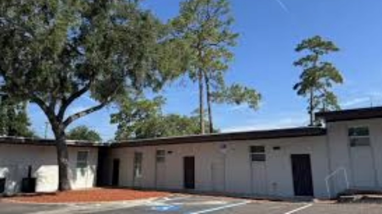 Exterior view of Mercy Oaks II affordable apartment community in Tampa, converted from a former commercial property.