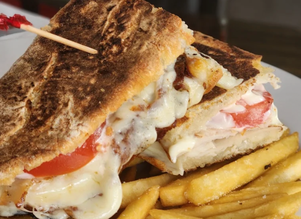 a cheese sandwich with tomato