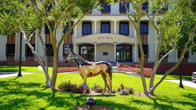 Horse statue standing on the lawn in front of Ocala, Florida's city hall