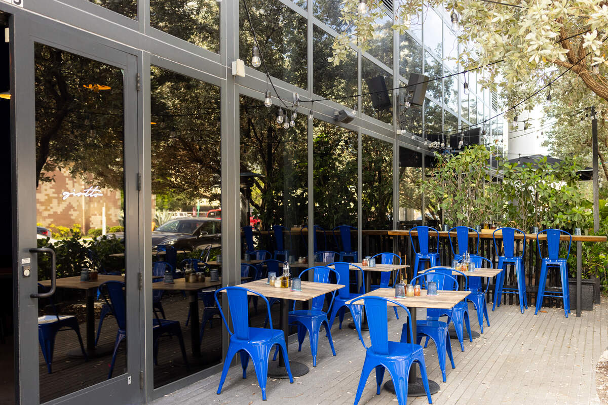 Outdoor tables at Giotto Italian restaurant in Miami.