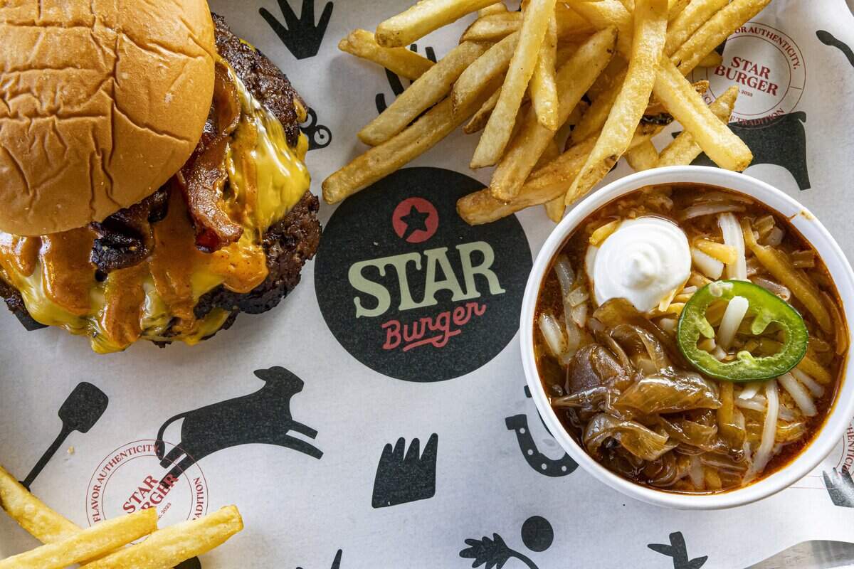 The Rancho Burger with Ranch Hand Chili and fries at Star Burger in Miami.