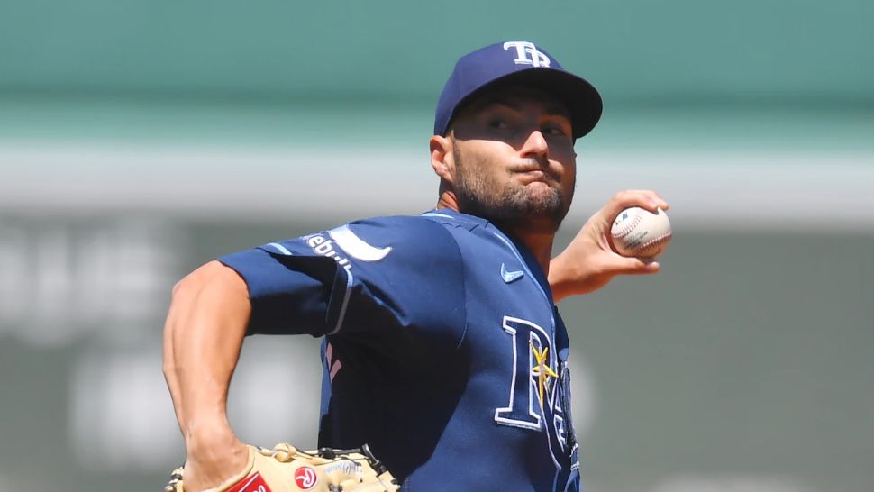Tampa Bay Rays' Shane McClanahan winds up for a pitch to a Boston Red Sox batter in the first inning of a baseball game, Sunday, July 19, 2026, in Boston. (AP Photo/Steven Senne)